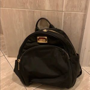 Michael Kors back pack.